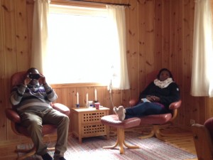 Zephania and Hoyce in the reading chairs at the cabin.