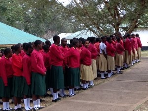After morning prayer, the students line up for announcements.