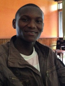 Goodluck is cajoled into smiling for the picture.