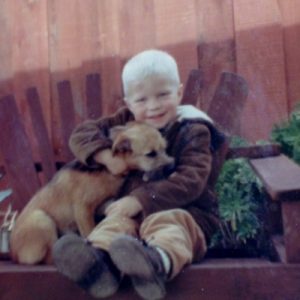 Eric did love dogs. It began early on the farm.