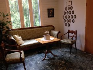 This is not your typical college utilitarian furnishings with beautiful carved wood chairs. I'm still wondering who the old bearded guy is who is pictured on the wall.