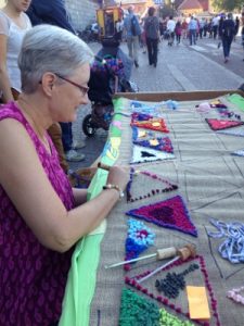 A traditional handicrafts center with an hands on opportunity for kids and adults, including Donna.