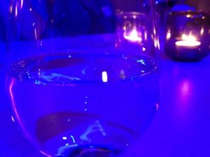 The ambience at the dinner table with ultraviolet lighting