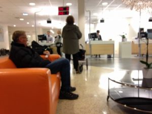 Waiting, waiting. (See the lighted number to display who is being served at which counter? These are common all over Sweden.)