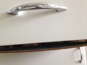 But see the gap at the bottom of the drawer. Somehow I need to secure the bottom panel to the front panel. Any suggestions?