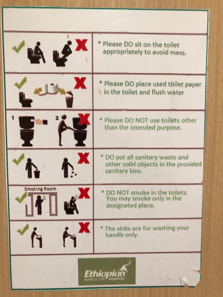 Helpful messages in the Addis Airport bathrooms!